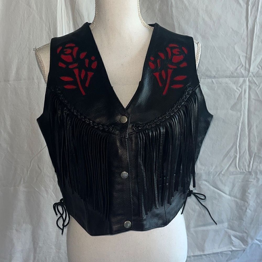 Interstate leather ￼Black Leather Fringe Vest with Rose Inlay on front and back.